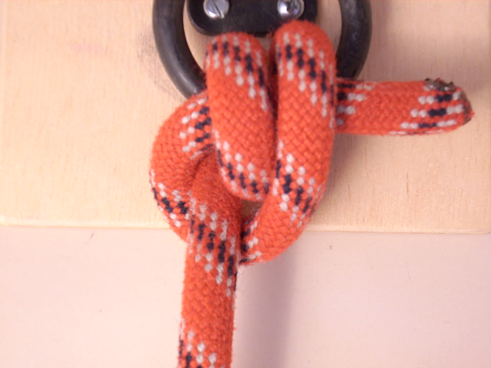 Photo of an anchor bend on a ring, before the finishing half hitch